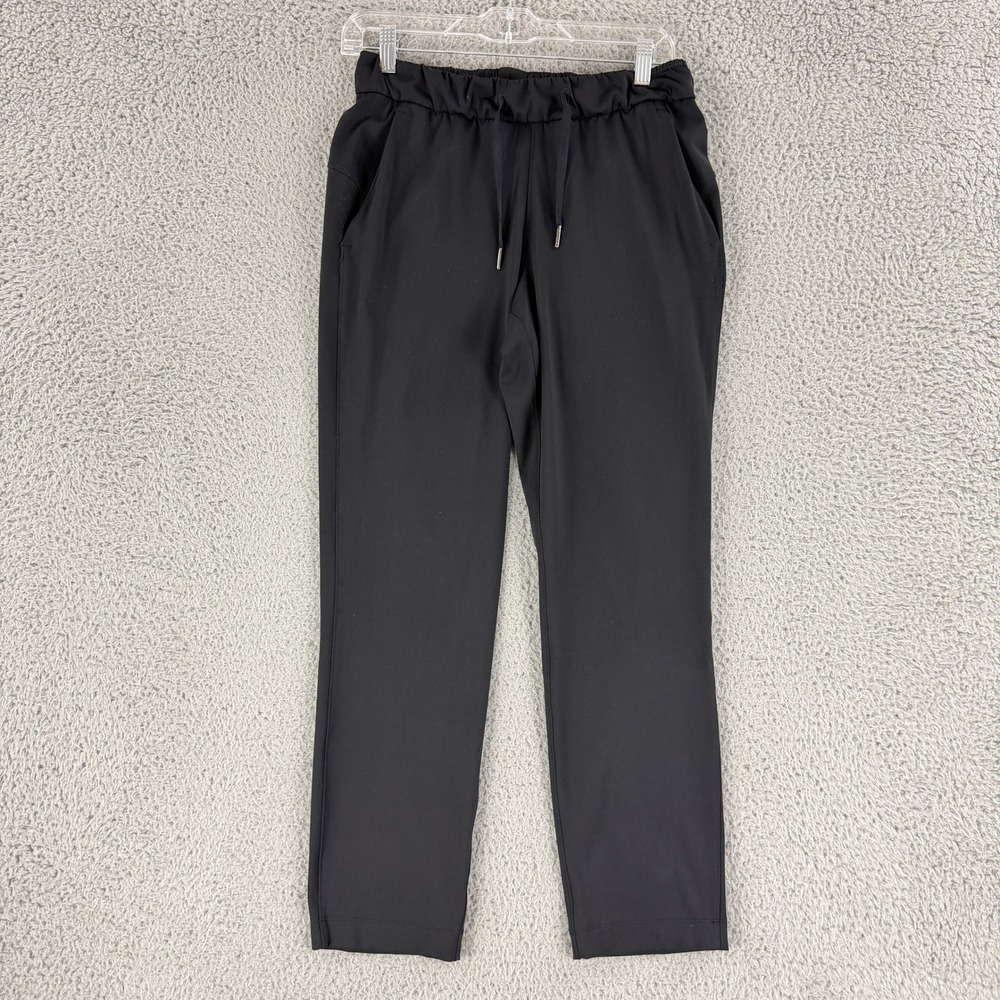 Lululemon On The Fly 7/8 Pants Womens 4 Black Luxtreme Stretch Travel Drawstring